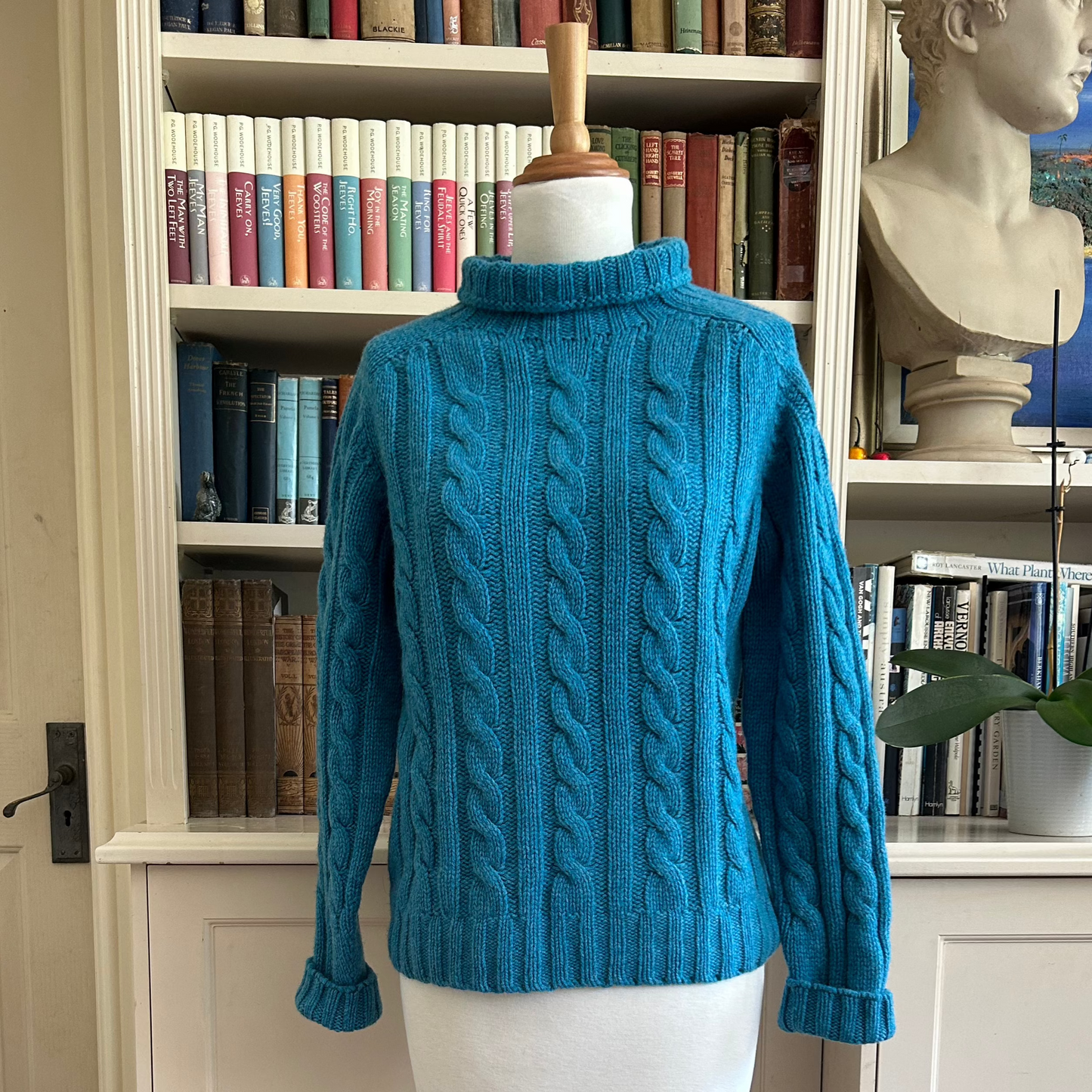 Harley of Scotalnd 100 wool women's cable jumper in blue.