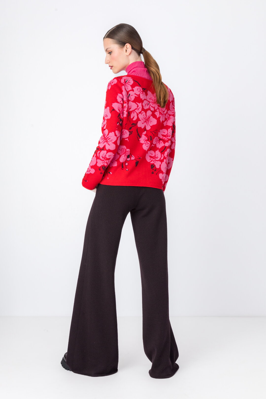 IVKO's round neck cardigan in red, back view