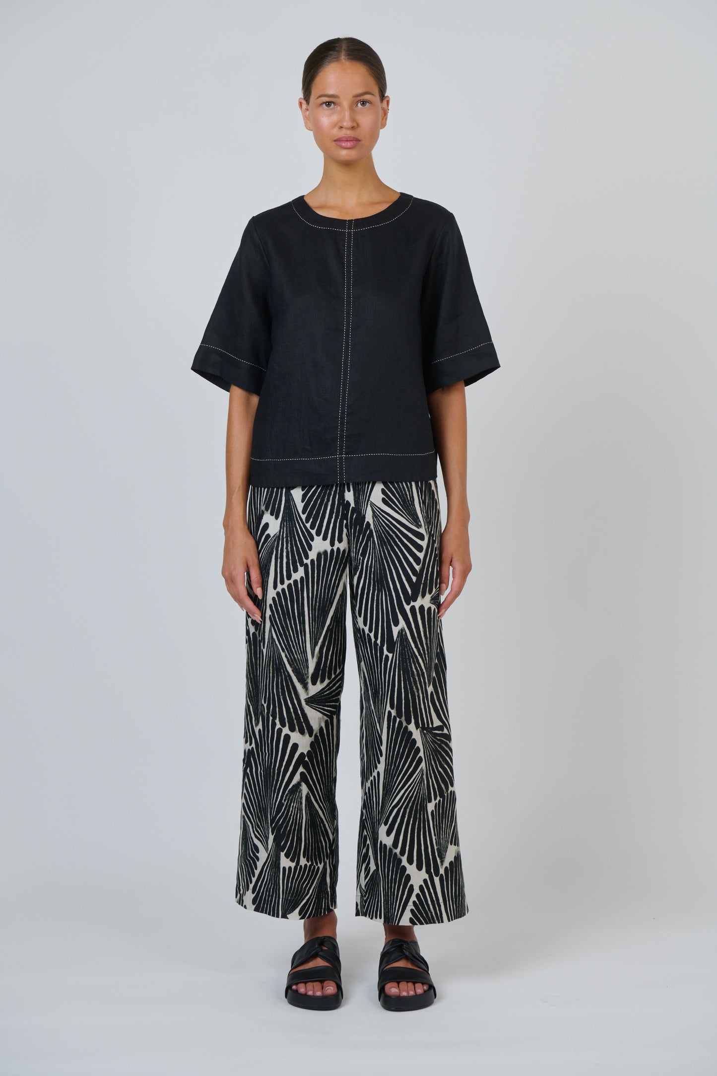 Naturals By O&J Black Linen top with White Stitching.