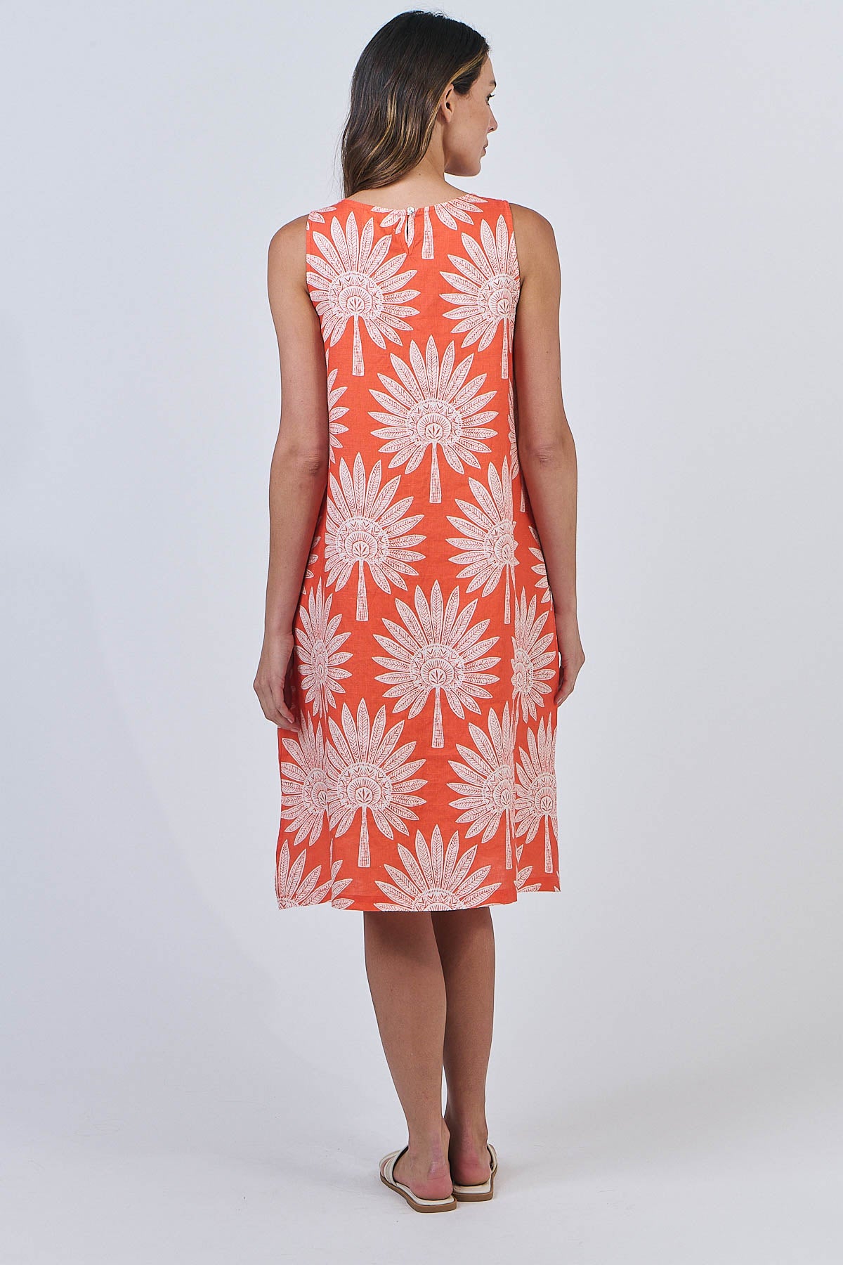 Natural fibres from Naturals by O&J. Linen dress in orange.