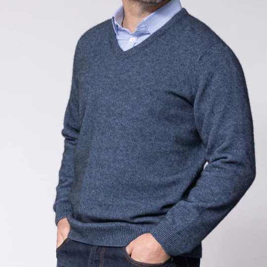 Quality Possum and Merino Wool knitwear. Noble Wilde Men's vee jumper in blue or neptune.