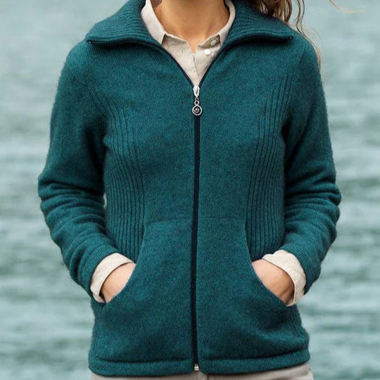 Quality Possum and Merino Wool knitwear. Noble Wilde zip jacket for women in teal green paua.