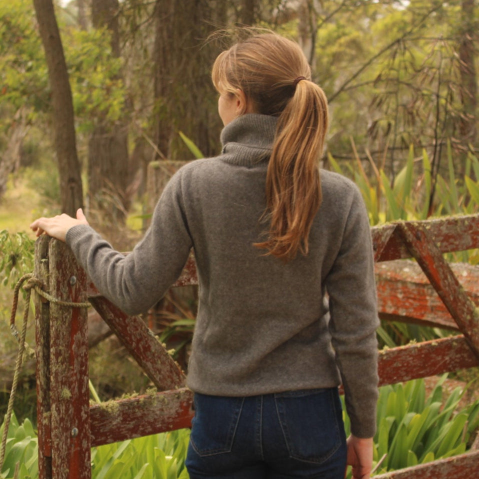Noble wilde possum knitwear. Womens polo neck in grey.