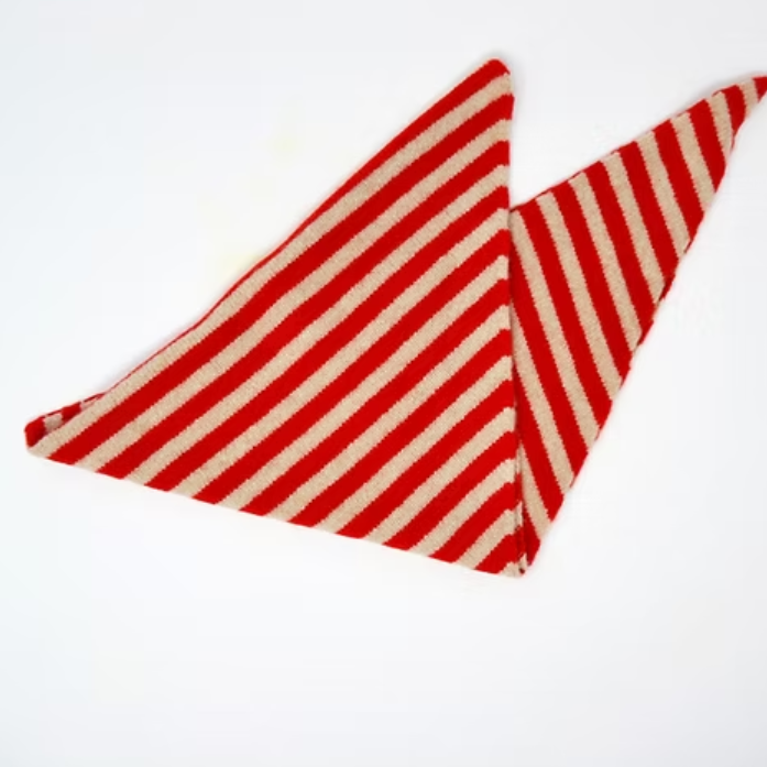 striped triangle knitted scarf in wool. red and oat.