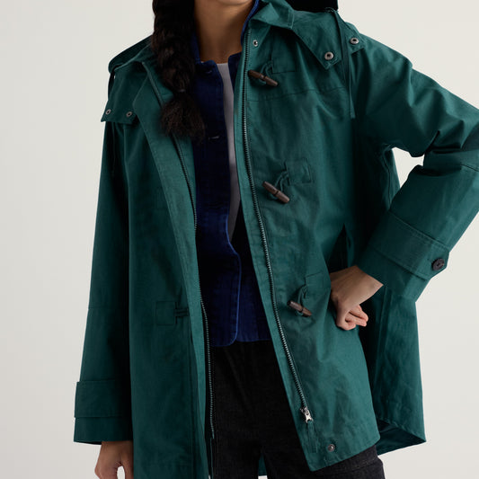 Seasalt Corwnwall women's coat with hood and toggles in dark green. Waterproof