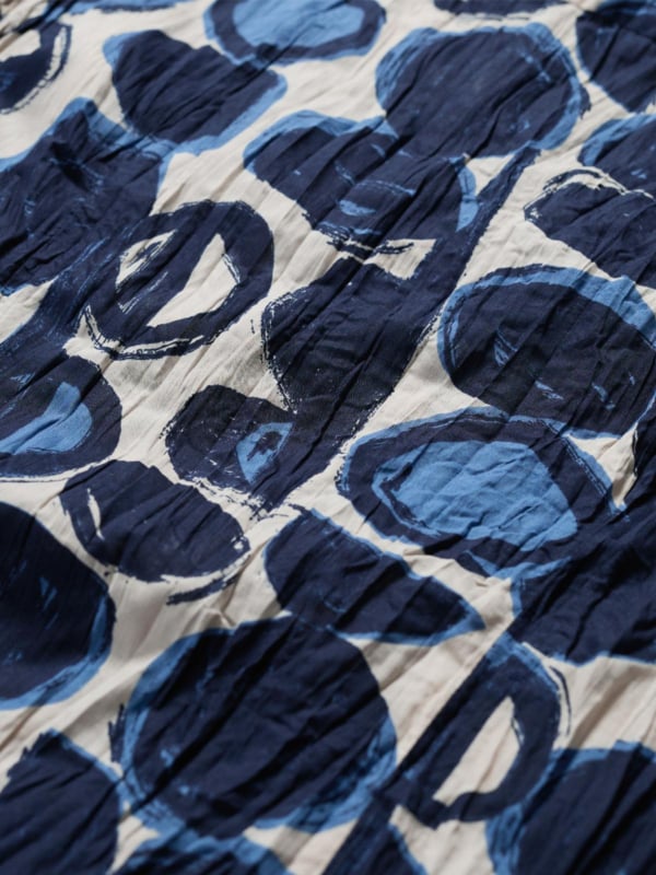 Close up of the cotton printed fabric in the Larissa Shirt in Pebble Monoprint Aran by SEASALT