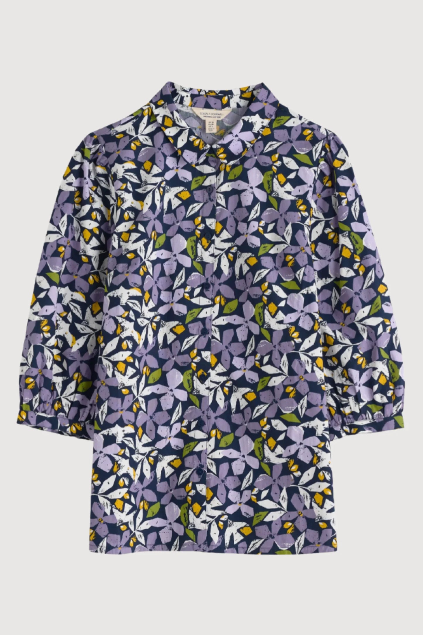 Flat lay of the floral Hope Cottage Blouse in Headland Collage Maritime by SEASALT