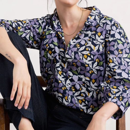 Woman wearing the Hope Cottage Blouse in Headland Collage Maritime by SEASALT