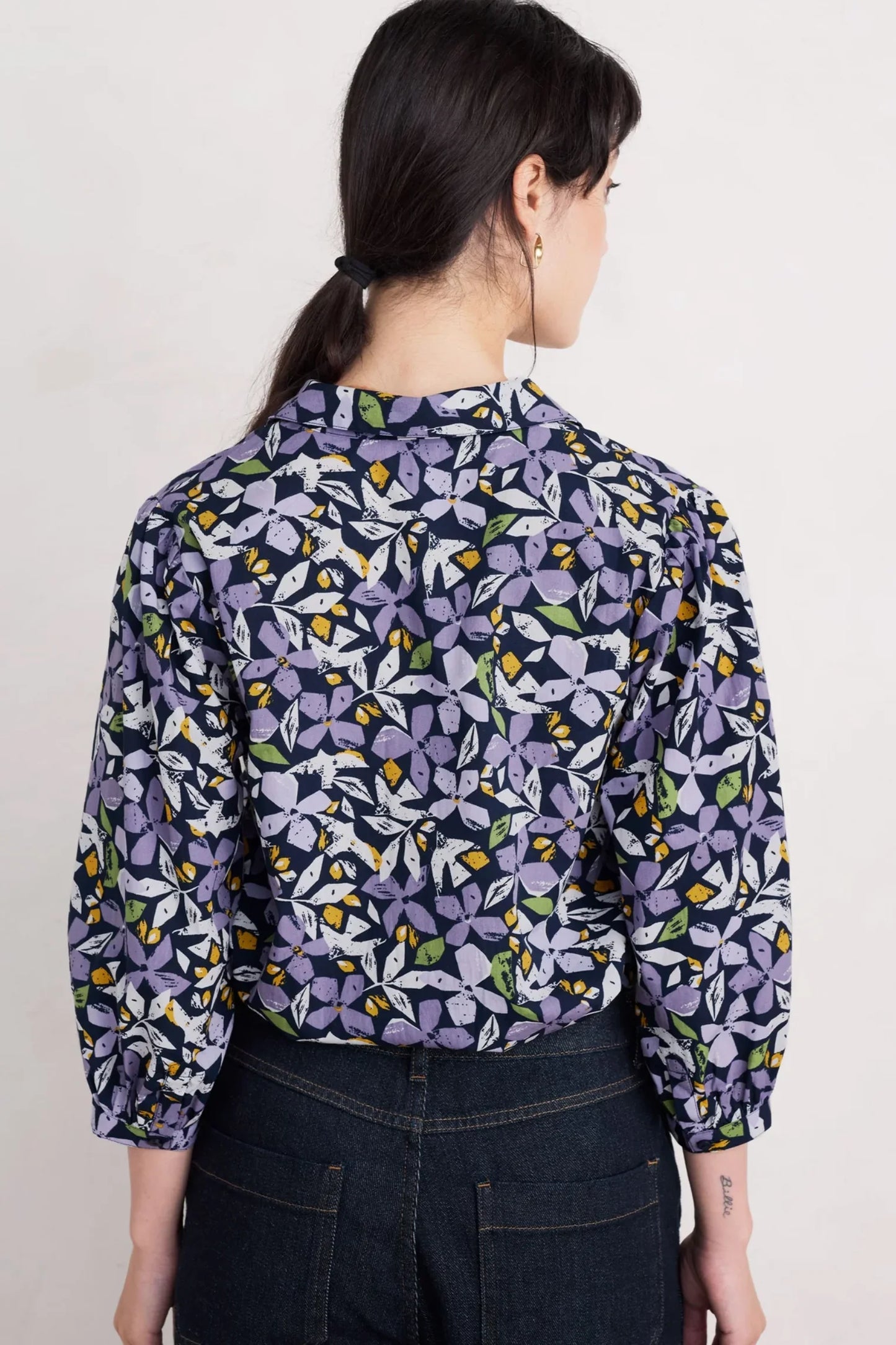 Woman wearing the Hope Cottage Blouse in Headland Collage Maritime by SEASALT