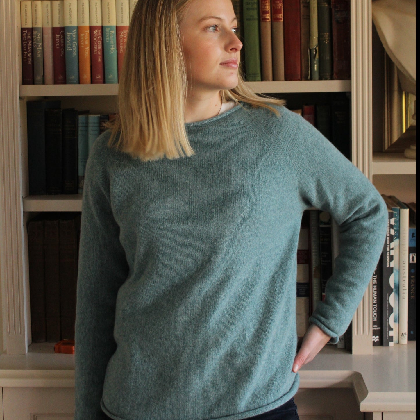 A premium grade merino lambs wool jumper from Harley of Scotland. In Oribe green it has a crew nwck and small rolls on the cuffs hem and neck. Beautiful Scottish Knitwear