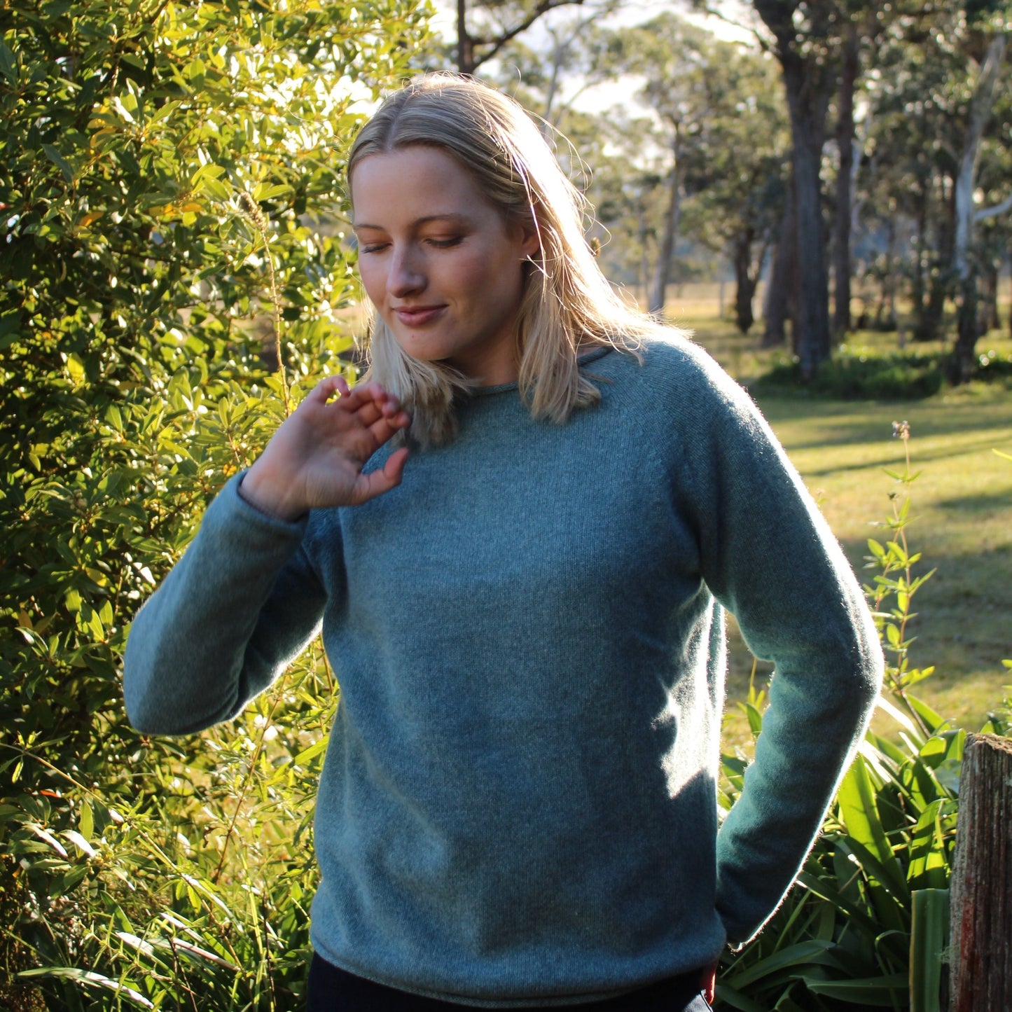 A premium grade merino lambs wool jumper from Harley of Scotland. In Oribe green it has a crew nwck and small rolls on the cuffs hem and neck. Beautiful Scottish Knitwear