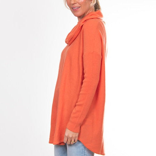 Bridge and Lord's women's curved hem cowl neck pullover in apricot crush
