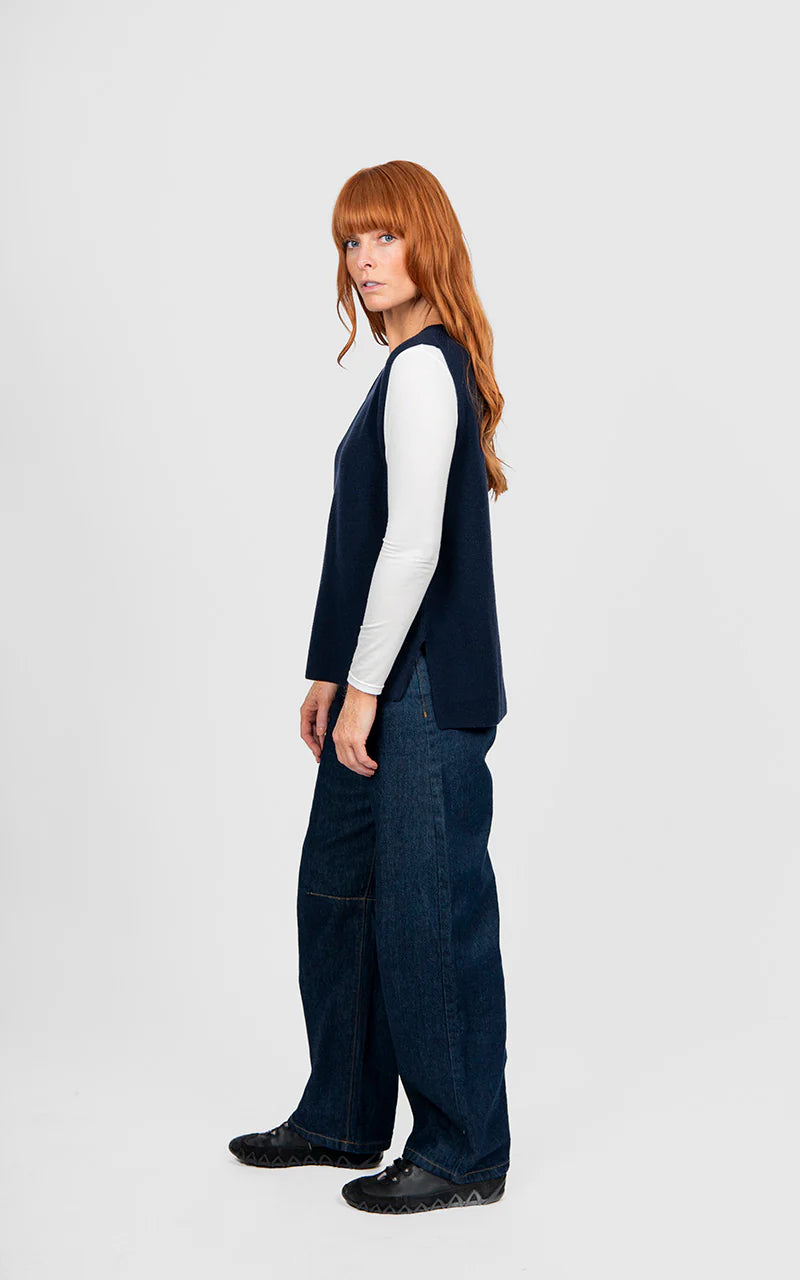 Woman wearing the Bridge and Lord Crew Neck Vest in Ink 