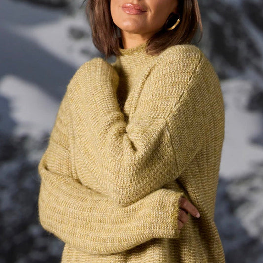 Woman wearing the Links stripe yellow pullover by Bridge and Lord in citrine