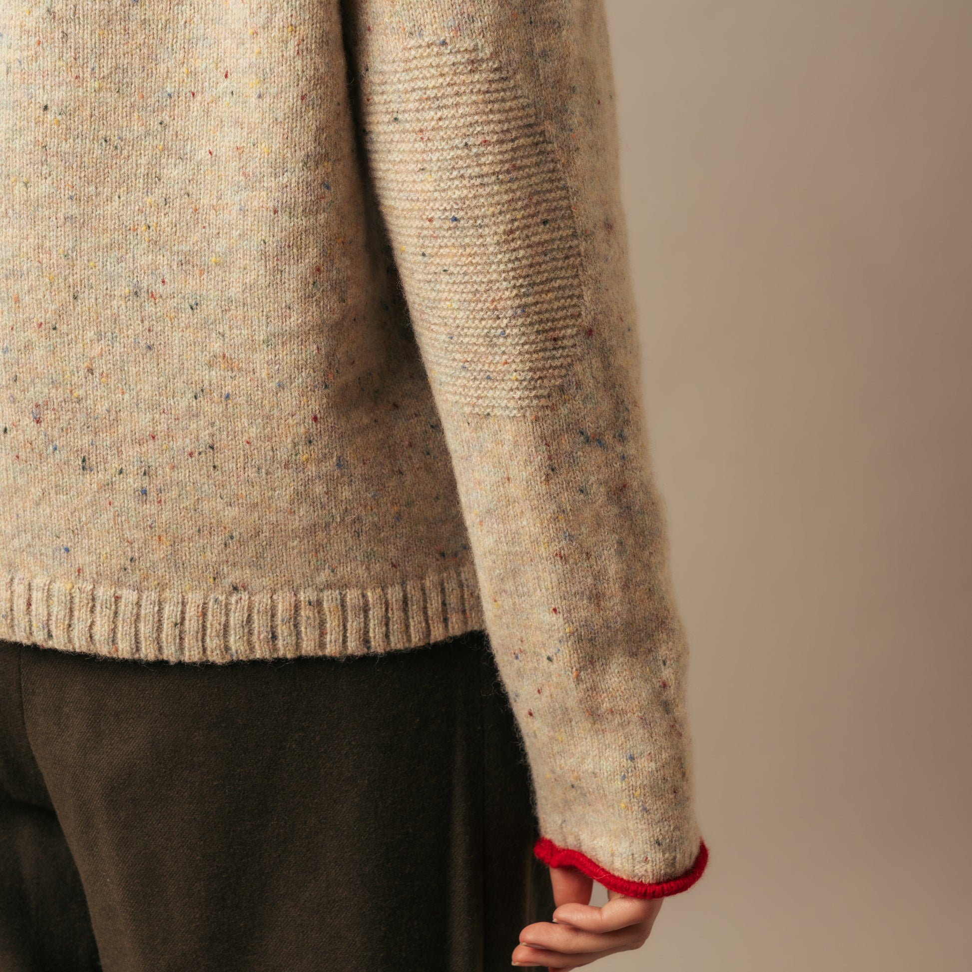 Eribe Tweed Sweater in Sand Elbow detail.