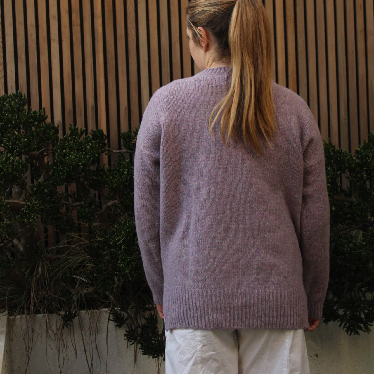 Woman wearing the Fisherman out of Ireland Dropped Shoulder Crew Jumper in Lilac