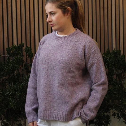 Woman wearing the Fisherman out of Ireland Dropped Shoulder Crew Jumper in Lilac