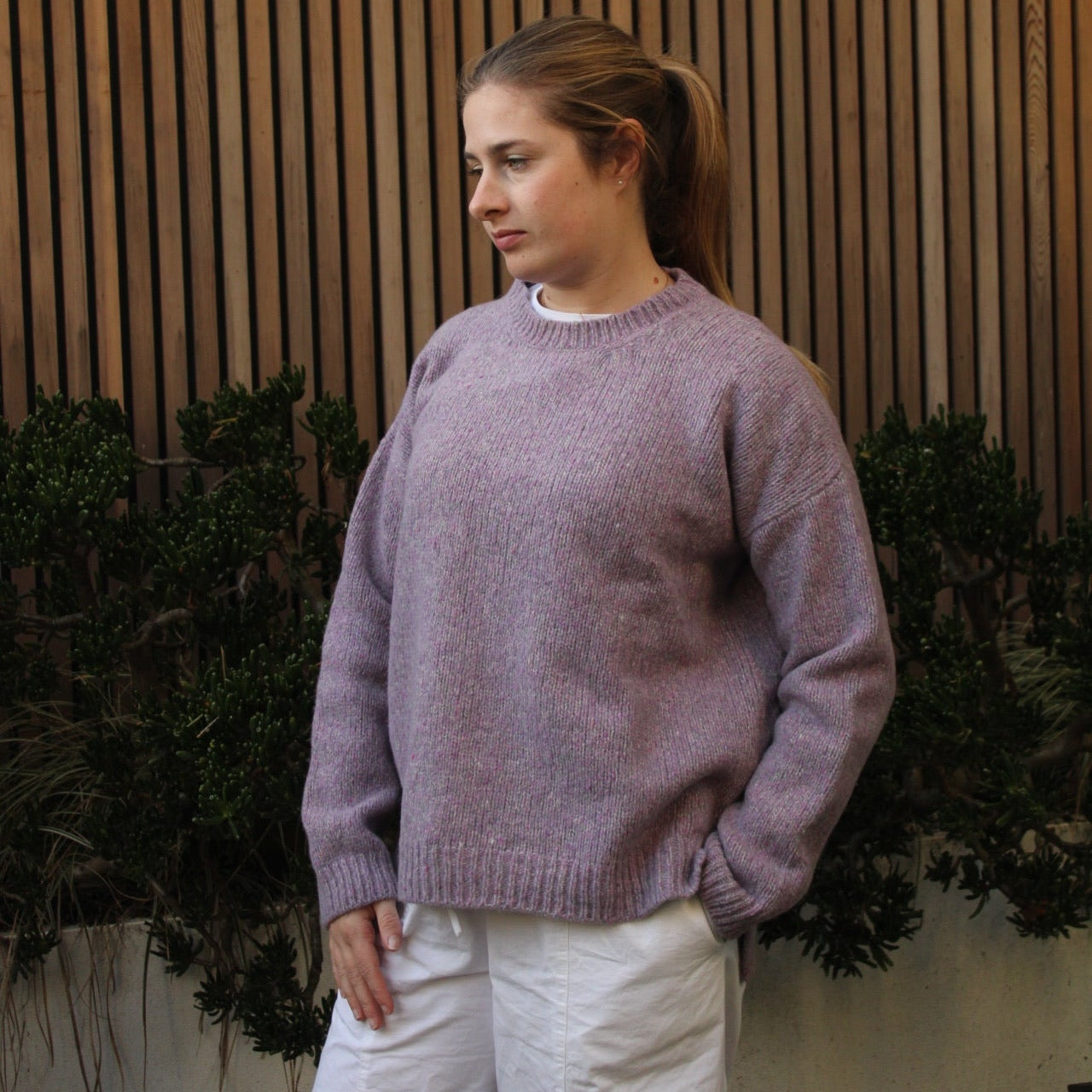 Woman wearing the Fisherman out of Ireland Dropped Shoulder Crew Jumper in Lilac