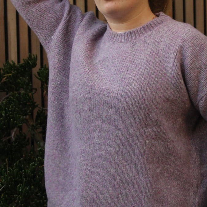 Woman wearing the Fisherman out of Ireland Dropped Shoulder Crew Jumper in Lilac