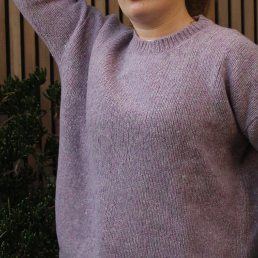 Woman wearing the Fisherman out of Ireland Dropped Shoulder Crew Jumper in Lilac