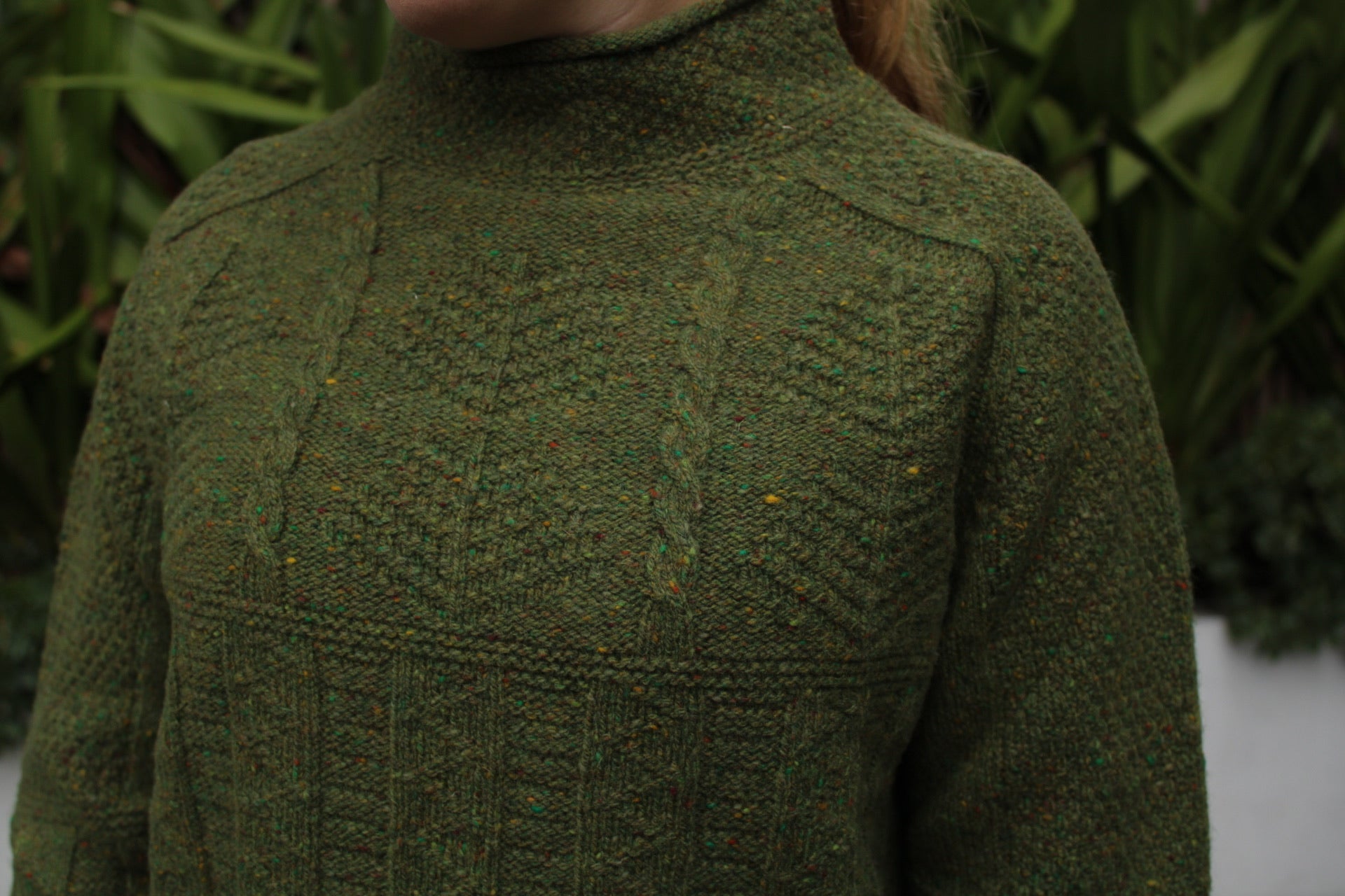 Close up of cable knit in aran tunic