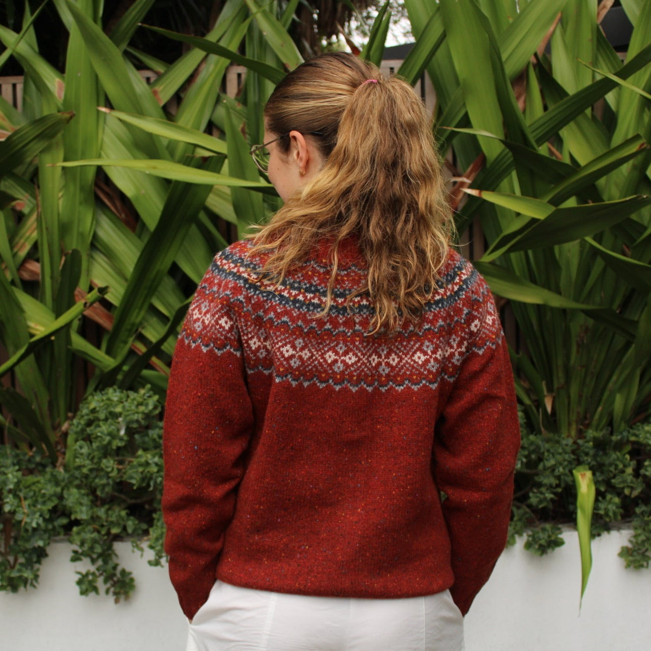 Back view of the Chunky Fairisle Nep wool Cardigan in Hoy red by Harley of Scotland