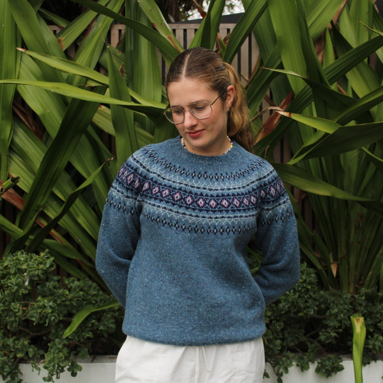 Woman wearing the Fairisle wool nep Jumper by Harley of Scotland in Ossian blue