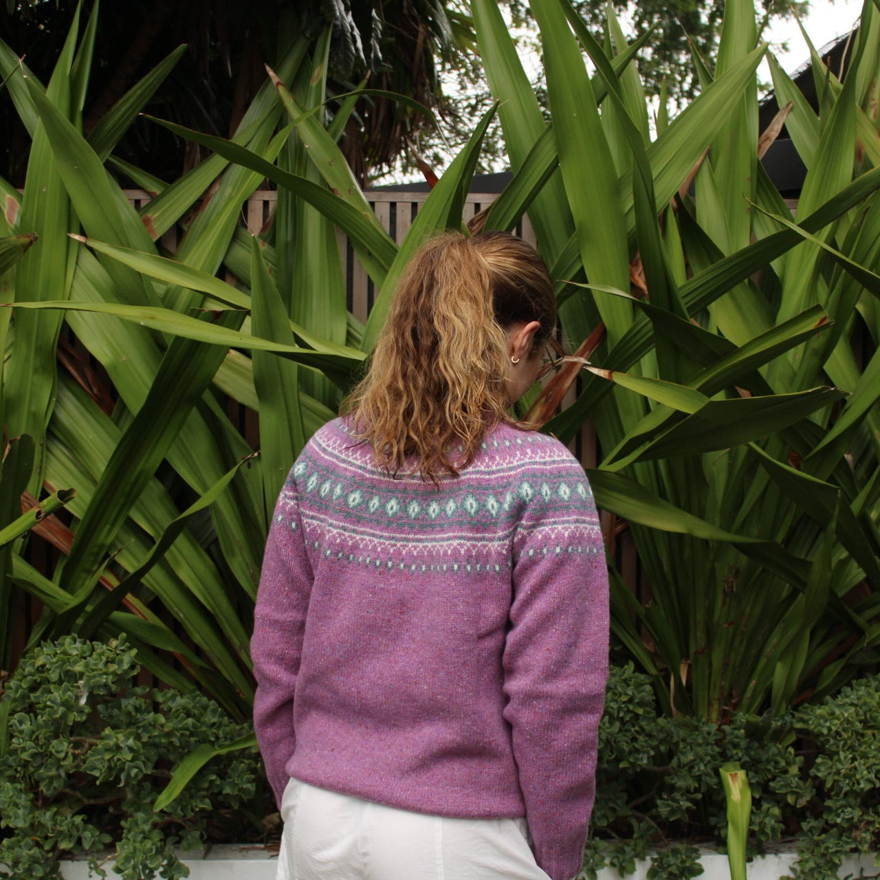 Woman wearing Harley of Scotland Fairisle Nep Woollen Jumper in Shuna purple