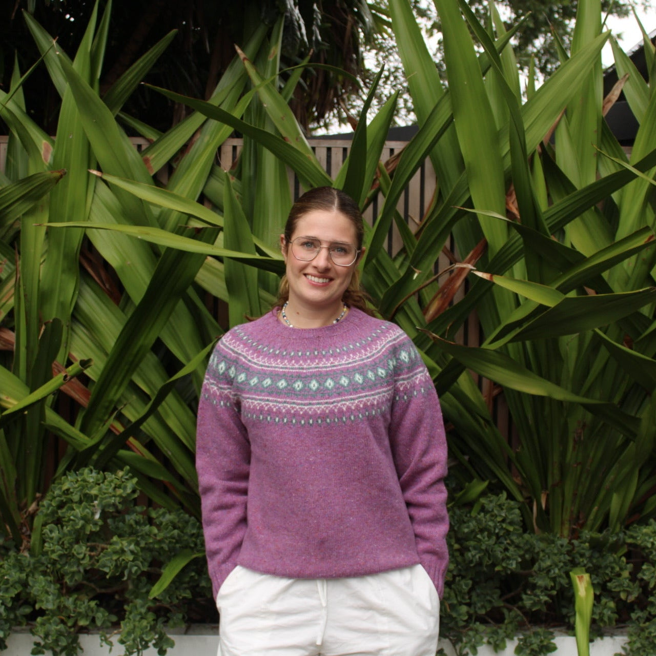 Woman wearing Harley of Scotland Fairisle Nep Woollen Jumper in Shuna purple