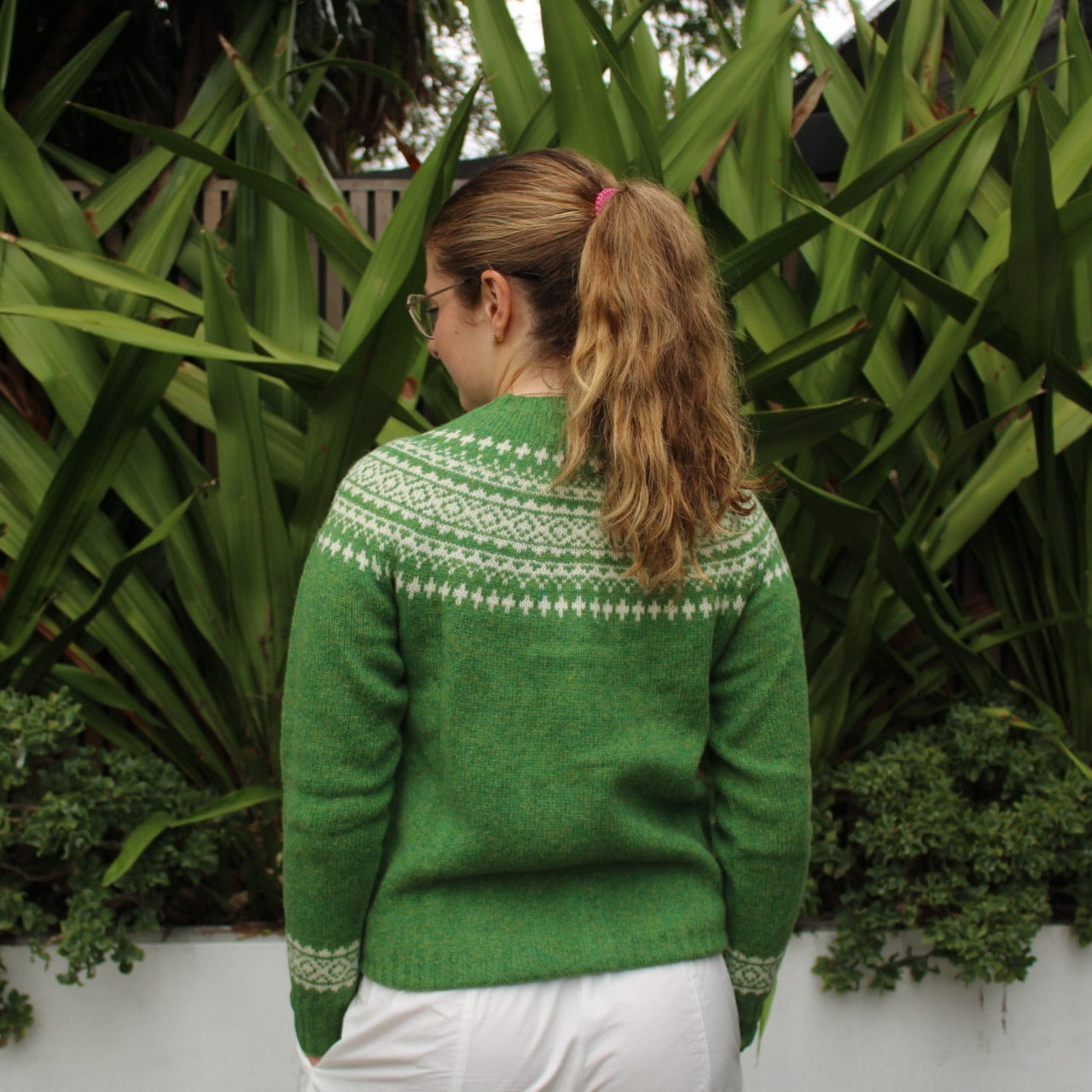 Back view of the Two Tone wool Fairisle Cardigan in Blaize green and white by Harley of Scotland