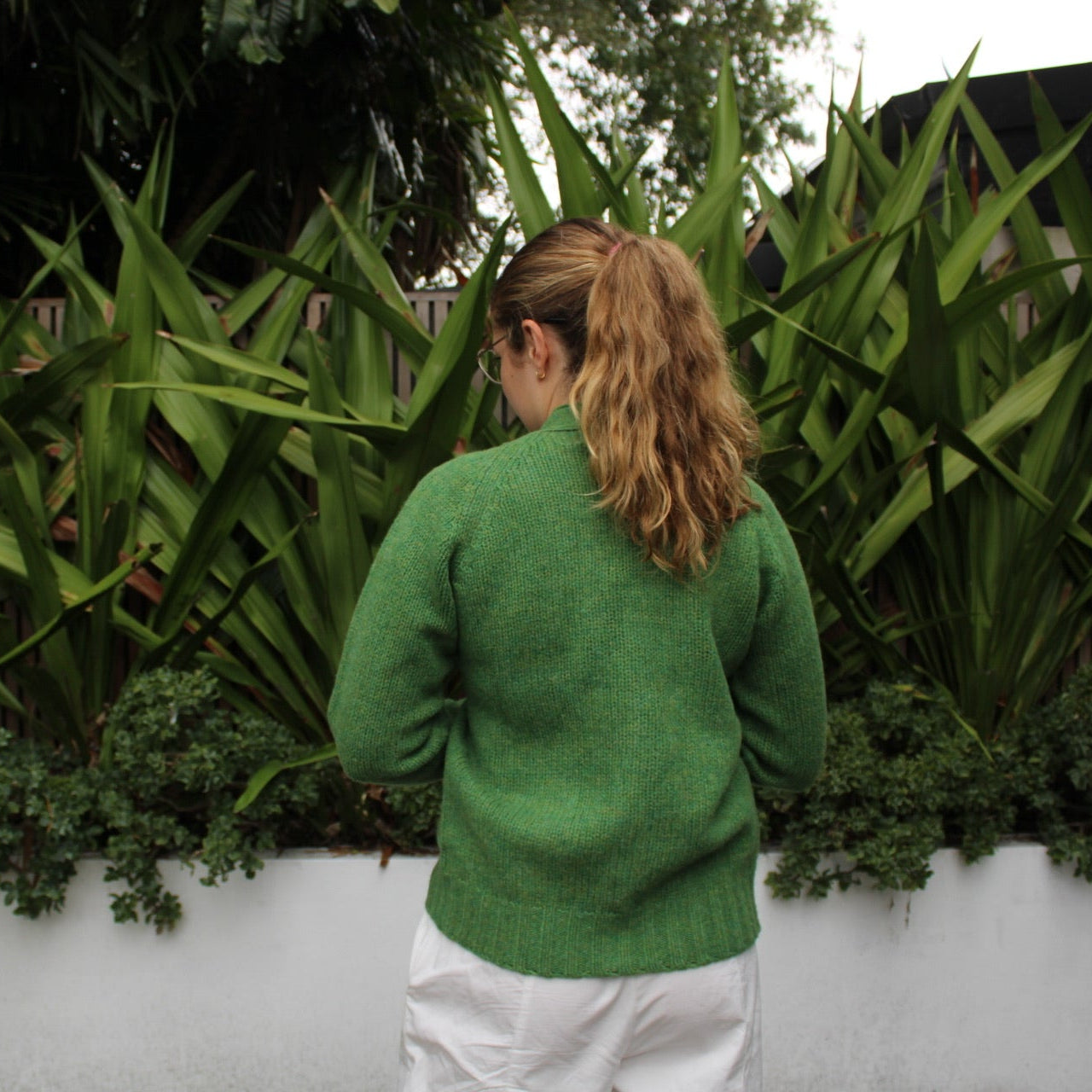 Back view of the Vee woollen Cardigan by Harley of Scotland in Blaize green