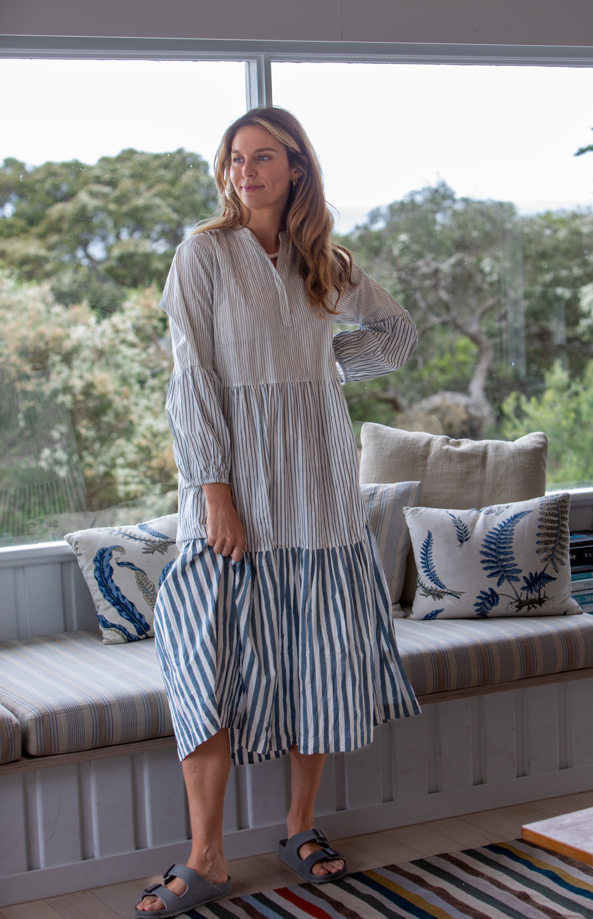 Woman wearing the Lee maxi cotton dress in pablo blue by Mandalay Designs