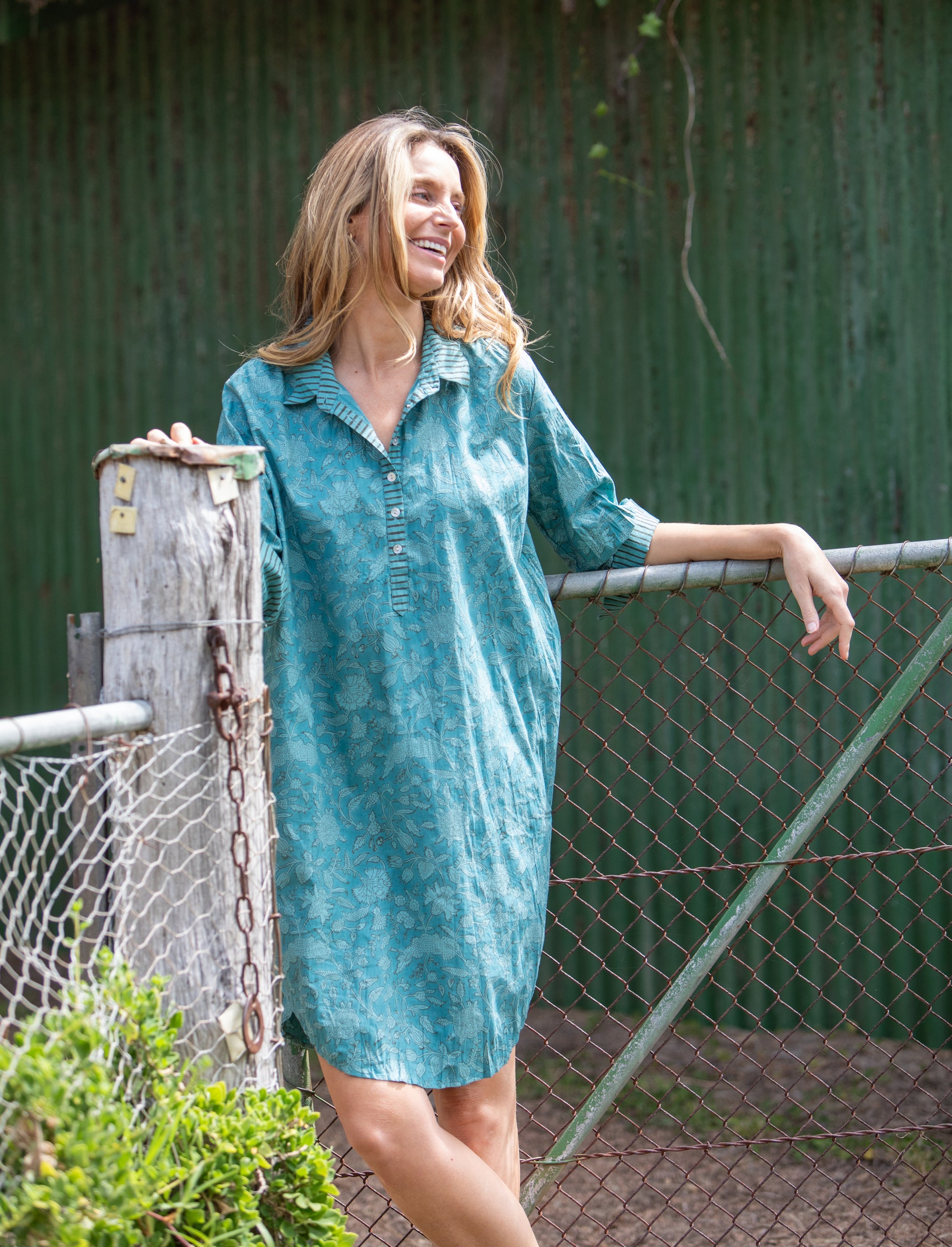 Woman wearing the Mandalay Designs shirtdress in organic cotton