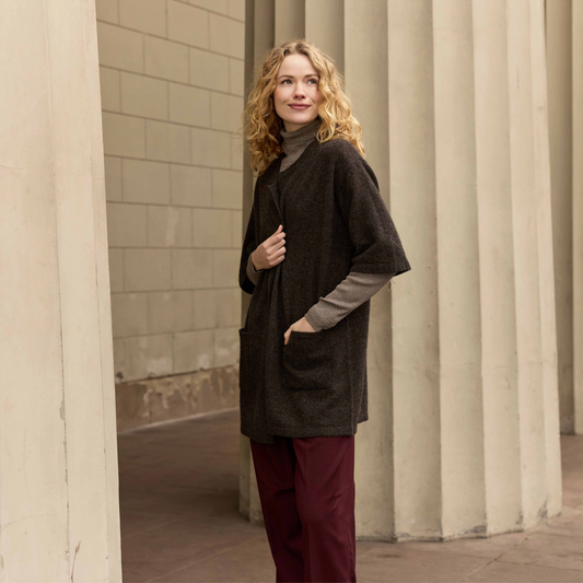 Woman wearing the Harmony wool Jacket in Dark Brown by Mansted