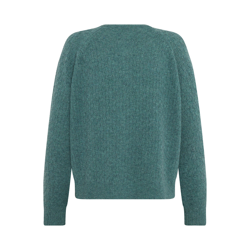 Back of the lambswool Korinne Cardigan in Sea blue by Mansted