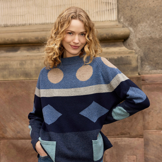 Woman wearing the woollen Popcorn Sweater in Soft Blue by Mansted