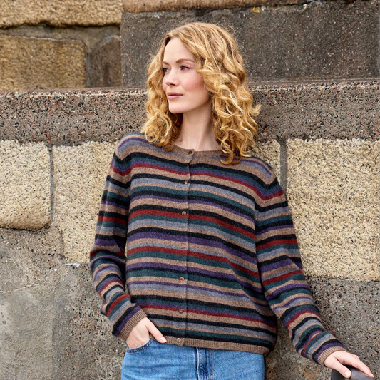 Woman wearing the Zemma Cardigan by Mansted in Mushroom stripes