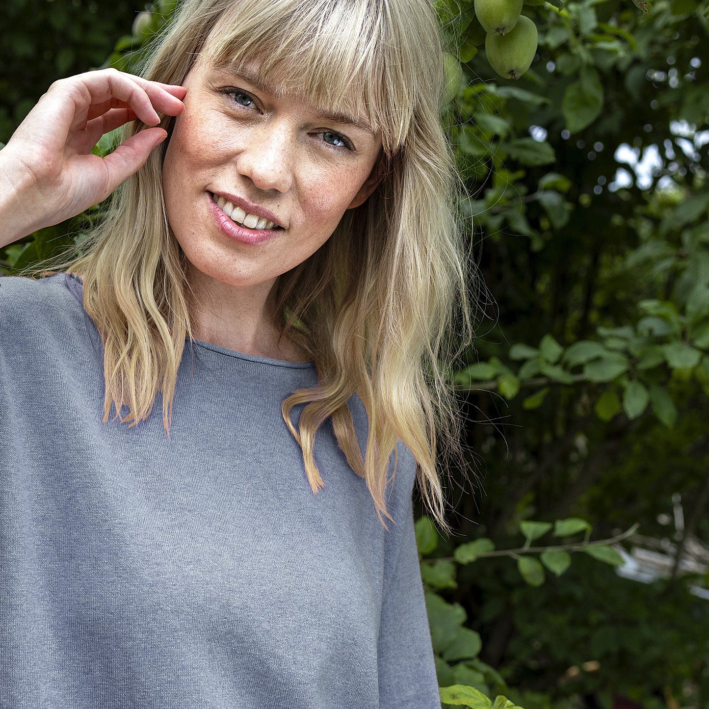 Woman wearing the NOK Oza Top in Soft Blue by Charlotte Mansted