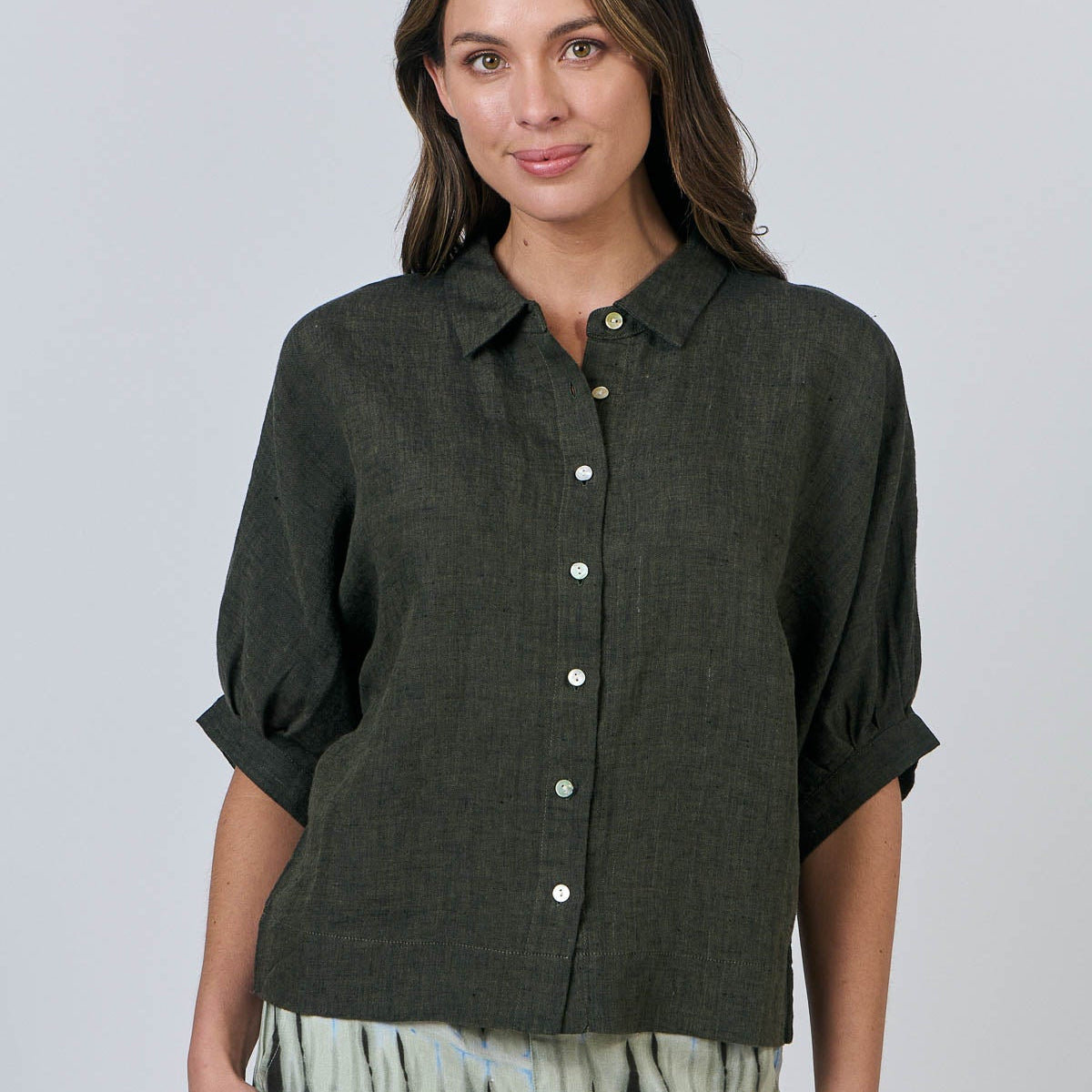 Woman wearing Naturals by O&J's 3/4 Sleeve Linen Shirt in Licorice