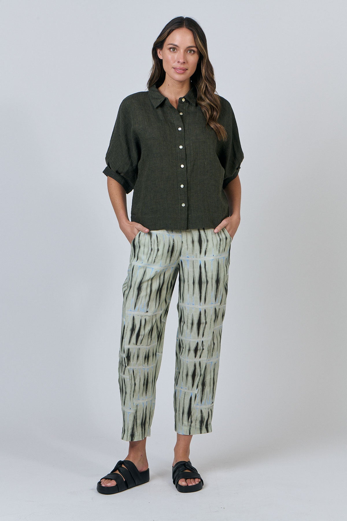 Woman wearing Naturals by O&J's 3/4 Sleeve Linen Shirt in Licorice
