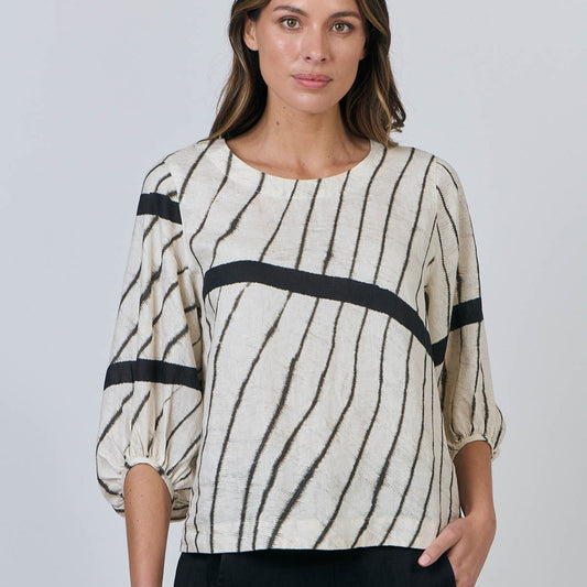 Woman wearing Natural by O&J's Bishop Sleeve Top in Isobars stripe