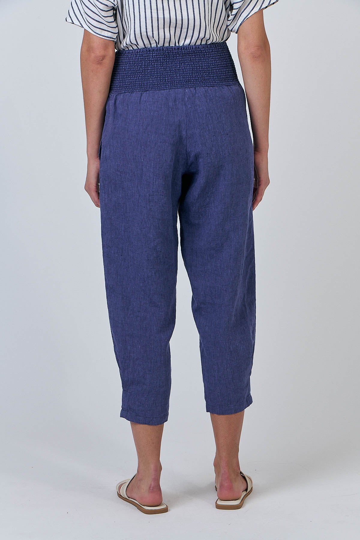 Woman wearing Natural by O&J's Cropped Linen Pants in Blueberry