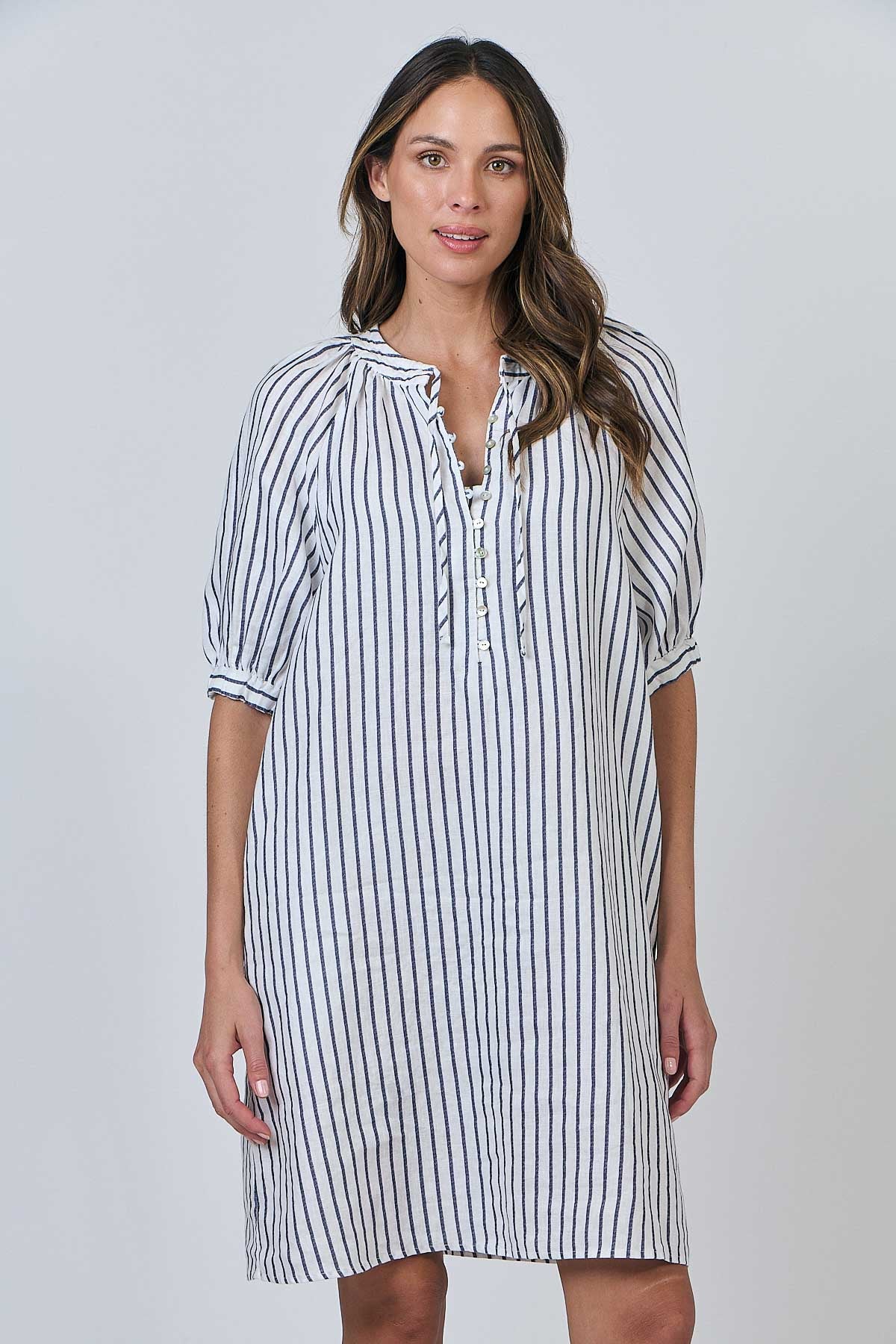 Woman wearing the Naturals by O&J's Striped Linen Dress in Blueberry
