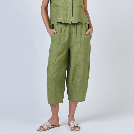 Woman wearing Naturals by O&J's Cropped Wide Linen Pants in Moss