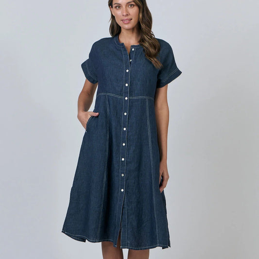 Woman with wearing the Contrast Stitch Linen Dress in denim Poseidon 
