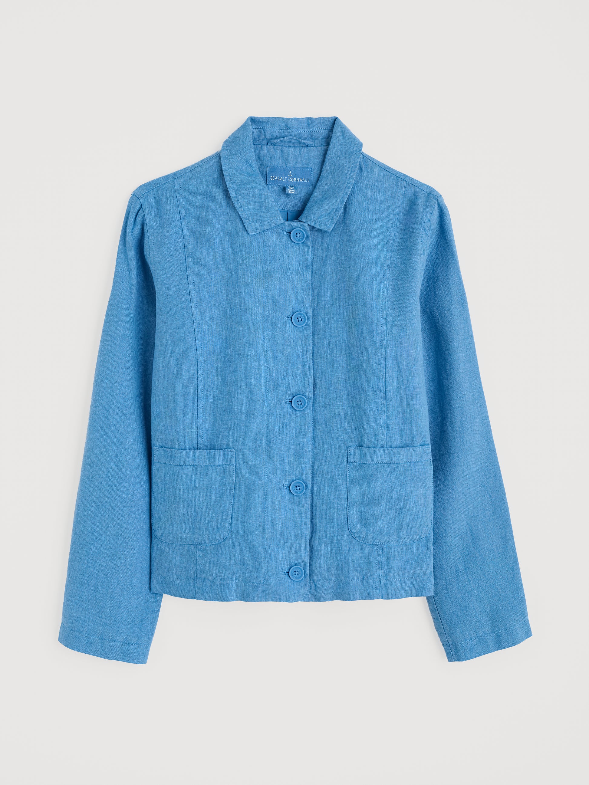 Flat lay of the Arame Linen Jacket by SEASALT for women in Clear Sky