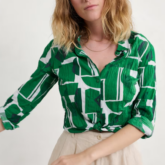 Woman wearing the cotton Larissa Shirt in green Paper Forms Island by SEASALT