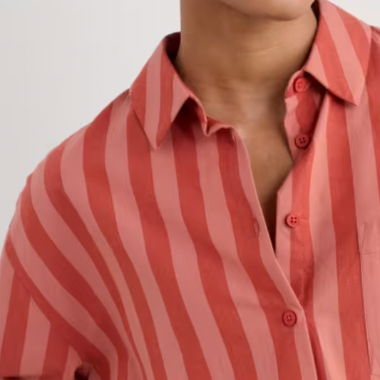 Woman wearing the Salt Path Shirt in Scallion Stripe Dark Cinnamon