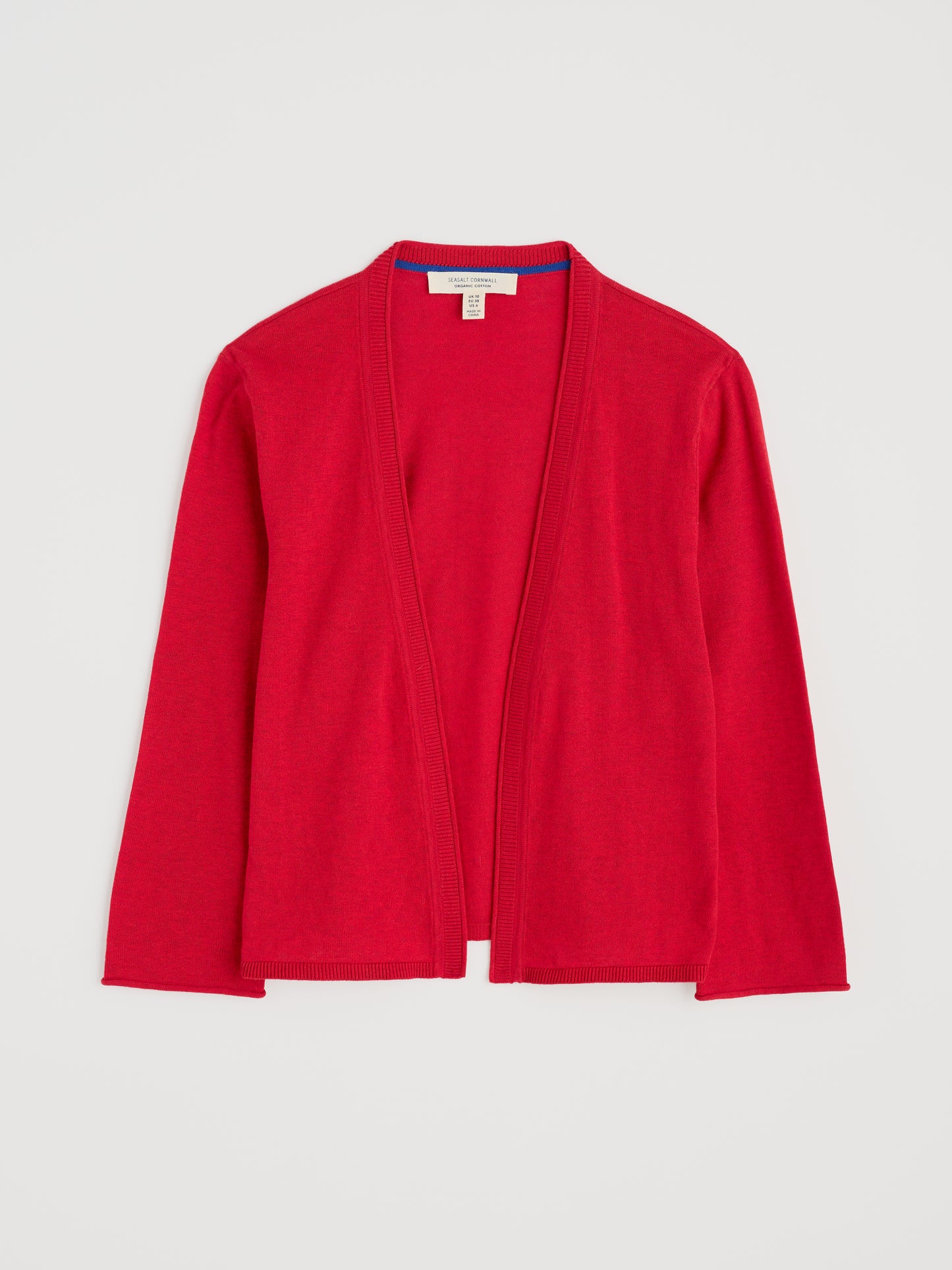 Flat lay of the Vanessa red Cardigan by SEASALT