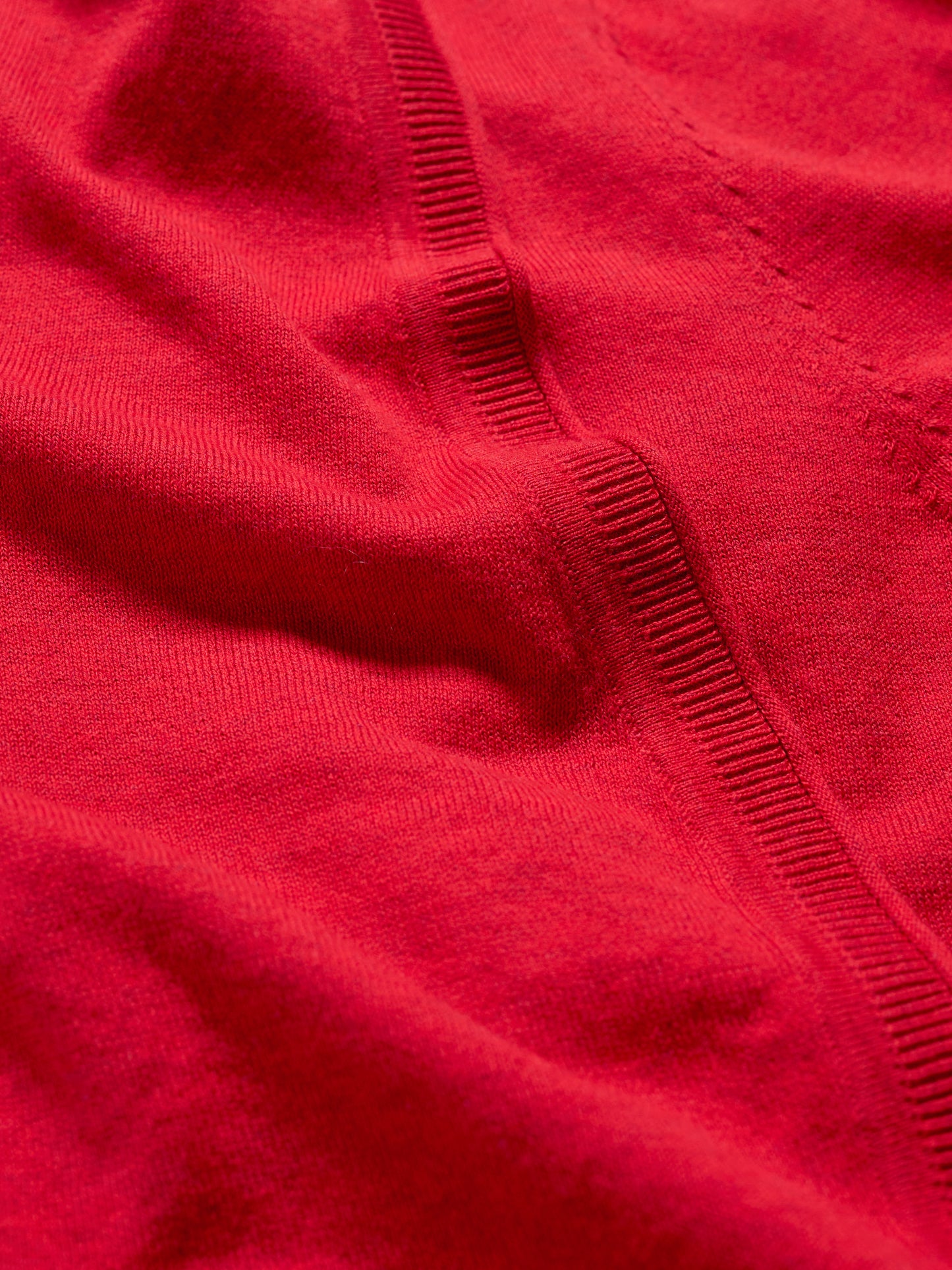 Close up of 100% cotton Scarlet red cardigan by SEASALT 